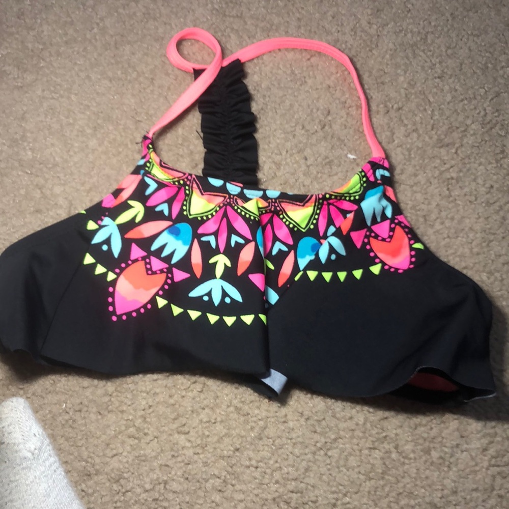 Size is a Girls 12/colors are neon pink, black, teal blue, green